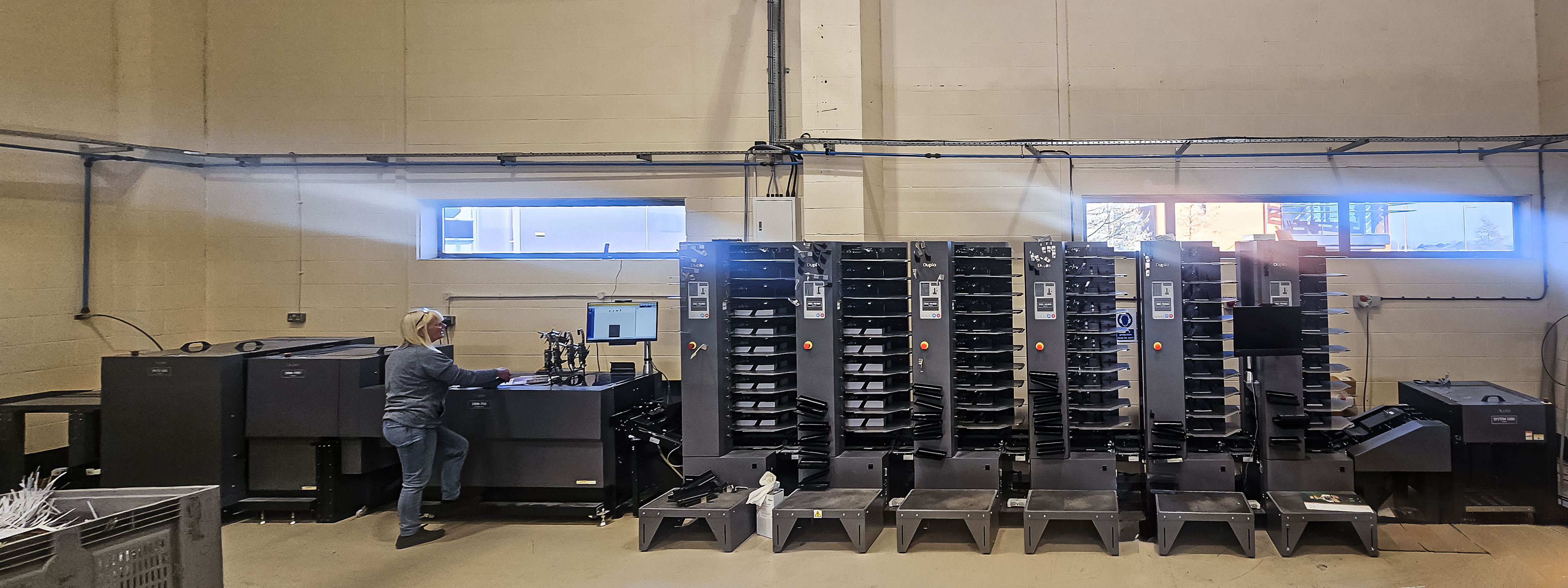 Flexpress's booklet system is largest configurations of the Duplo DBM-700 booklet system globally