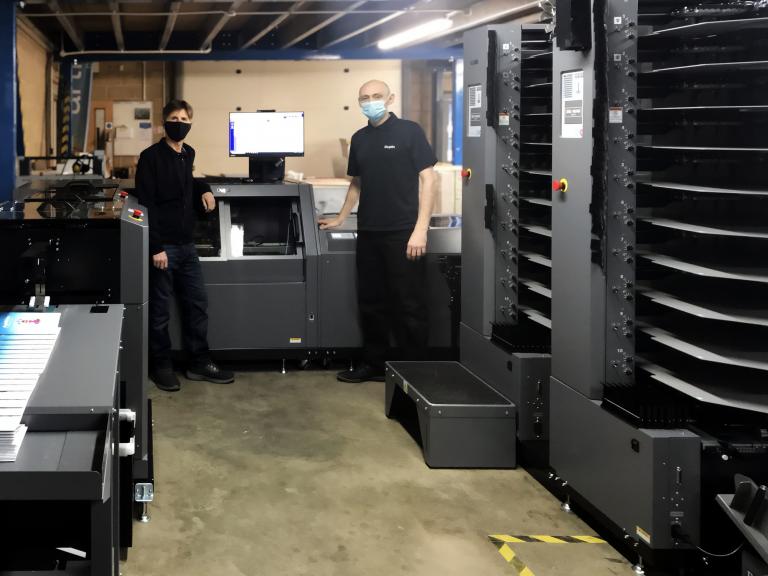 Artisan Litho increases productivity with new iSaddle Pro installation. 