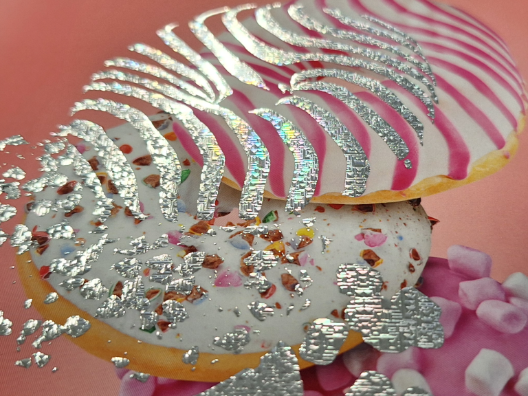 Image showing what misaligned print embellishments, foil in particular, looks like. 